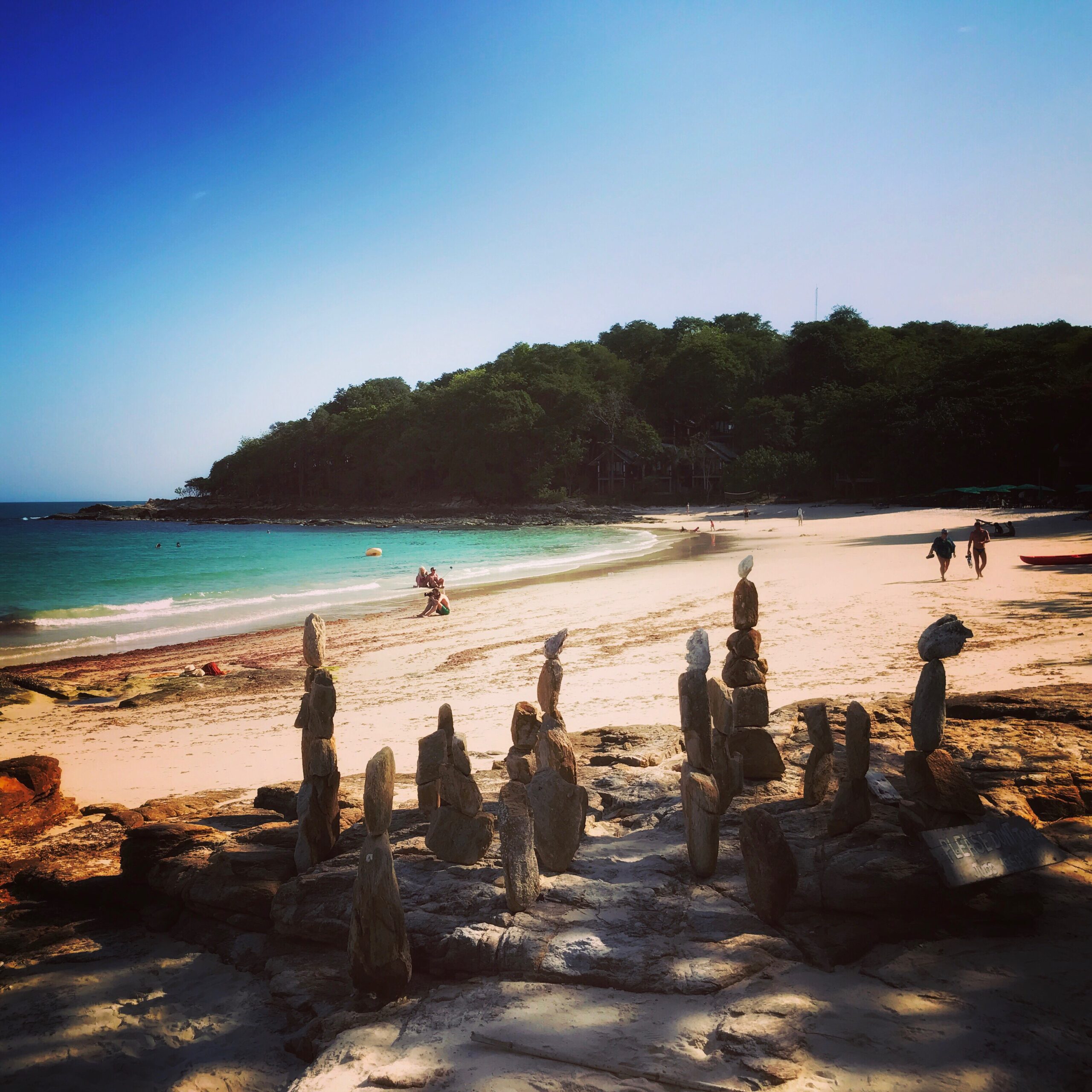 scenic-view-beach-against-blue-sky