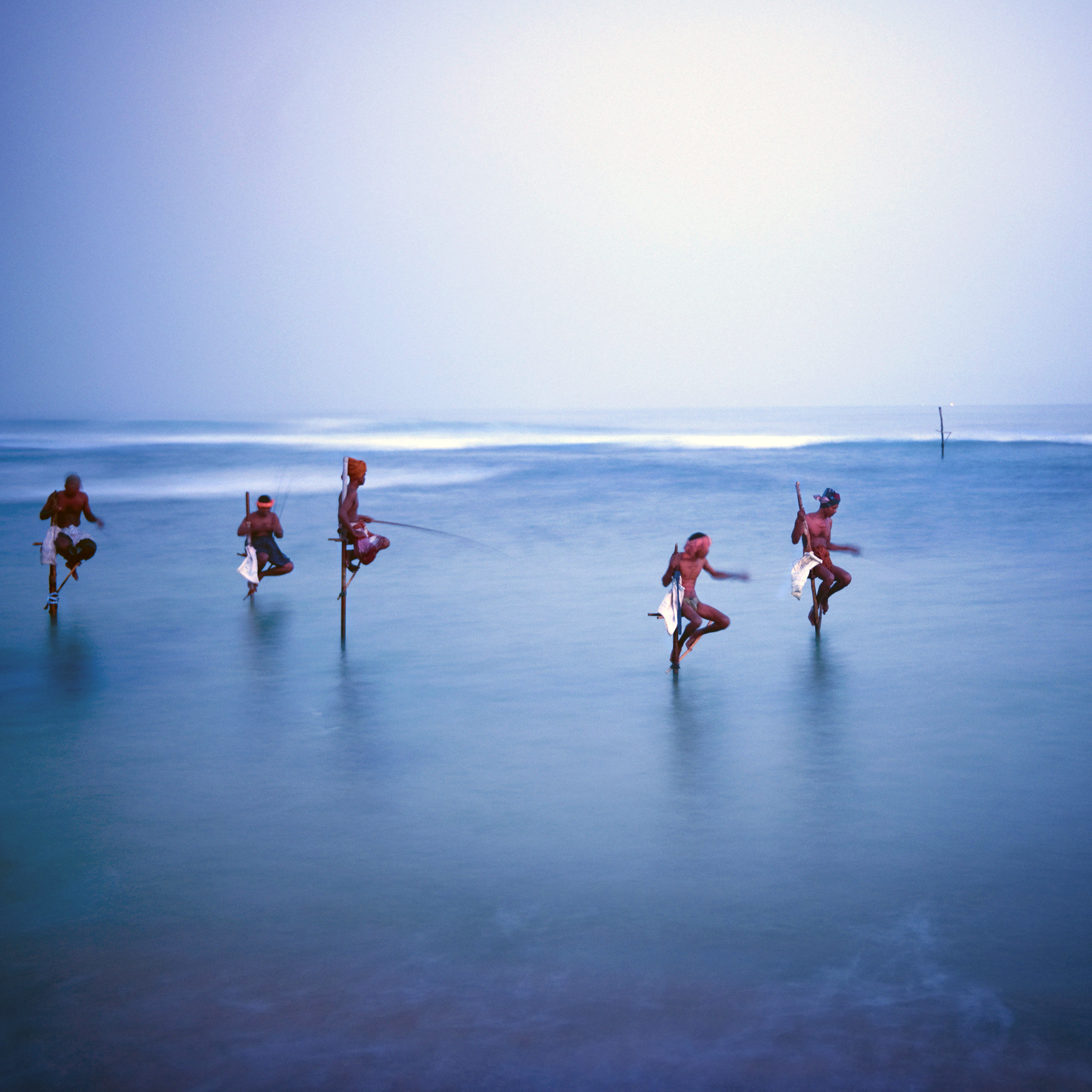Traditional stilt fishermen in Sri Lanka.